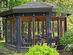 This octagonal custom cedar gazebo is the go to place in the evening it also has speakers built in a ceiling fan to move the humid summer air and screens to keep the bugs at bay. There are also cu