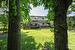 View of rear yard looking back from golf course