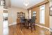 Formal dining area opens to living room and offers easy access to kitchen.