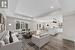 Open concept kitchen/dining/livingroom. Virtually staged.