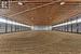 Indoor Arena/Barn with 15 box stalls