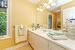 Bathroom with vanity and tile patterned floors