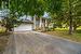 Neoclassical home featuring a garage