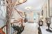 Foyer featuring a textured ceiling and light tile patterned floors