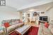 Living room featuring hardwood / wood-style floors and a textured ceiling