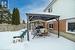 Snow covered patio featuring a gazebo