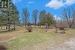 Beautiful yard with perrennial beds and storage shed