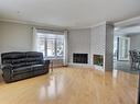 Salon - 151 Rue Marchildon, Amos, QC  - Indoor Photo Showing Living Room With Fireplace 