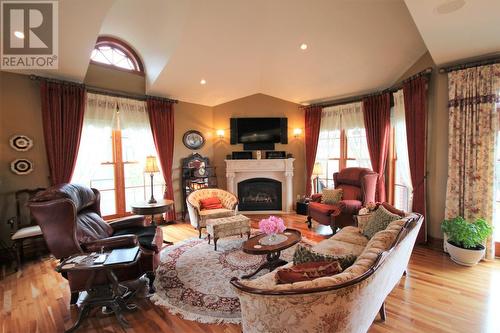 1829 86 Avenue, Dawson Creek, BC - Indoor Photo Showing Living Room With Fireplace