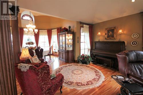 1829 86 Avenue, Dawson Creek, BC - Indoor Photo Showing Living Room With Fireplace