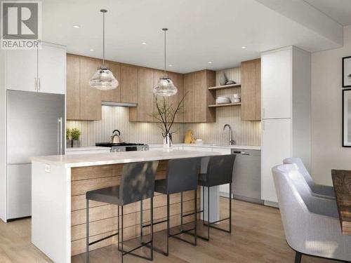 101-7020 Tofino Street, Powell River, BC - Indoor Photo Showing Kitchen With Stainless Steel Kitchen With Upgraded Kitchen