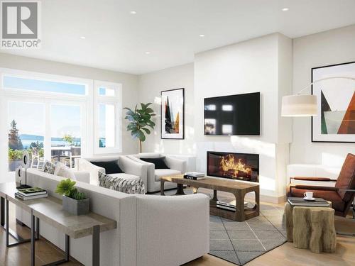 201-7020 Tofino Street, Powell River, BC - Indoor Photo Showing Living Room With Fireplace