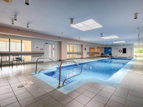 Pool - 401-5115 Boul. De L'Assomption, Montréal (Rosemont/La Petite-Patrie), QC - Indoor Photo Showing Other Room With In Ground Pool