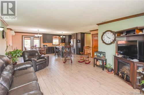 191 Omer Street, Pointe-À-Tom, NB - Indoor Photo Showing Living Room With Fireplace