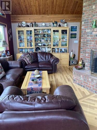 4221 Lodge Road, Lac La Hache, BC - Indoor Photo Showing Living Room With Fireplace