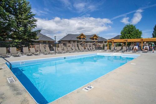 334 - 300 Bighorn Boulevard, Radium Hot Springs, BC - Outdoor With In Ground Pool With Backyard
