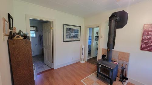 712 Lake Avenue, Silverton, BC - Indoor Photo Showing Other Room With Fireplace