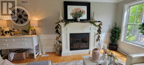 23 Atlantic Street, Marystown, NL - Indoor Photo Showing Living Room With Fireplace