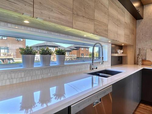 Kitchen - Rue De L'Ancrage, Lanoraie, QC - Indoor Photo Showing Kitchen With Double Sink