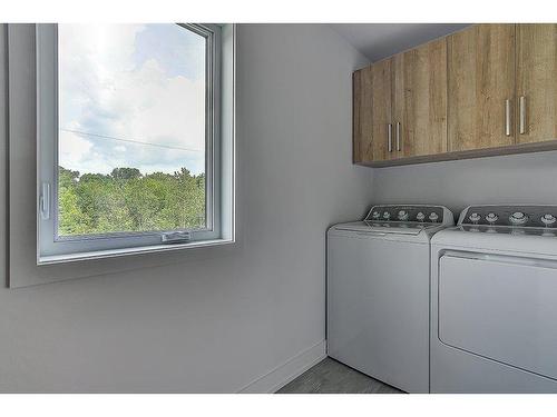 Laundry room - Rue De L'Ancrage, Lanoraie, QC - Indoor Photo Showing Laundry Room