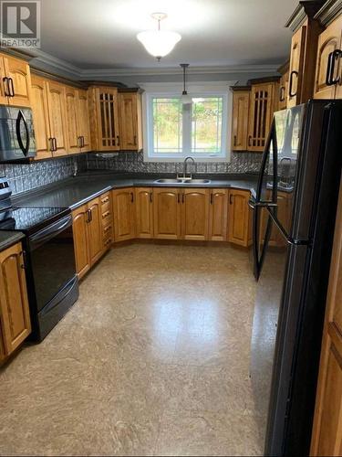 10 Crestview Heights, Marystown, NL - Indoor Photo Showing Kitchen With Double Sink