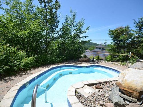 Pool - 518-140 Ch. Au Pied-De-La-Montagne, Mont-Tremblant, QC - Outdoor With In Ground Pool With Backyard