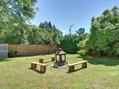 Cour - 557 Rue St-Georges, Mont-Tremblant, QC - Outdoor With Backyard