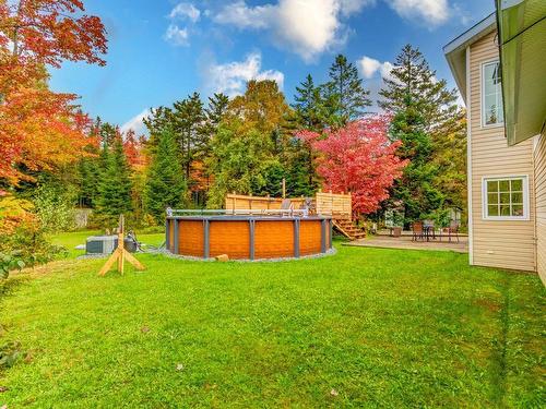 Backyard - 680 Route 161, Saints-Martyrs-Canadiens, QC - Outdoor With Above Ground Pool With Backyard