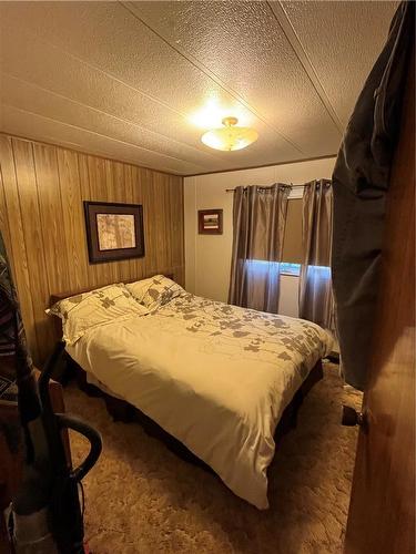 22 Jackson Beach Road, Shoal Lake, MB - Indoor Photo Showing Bedroom