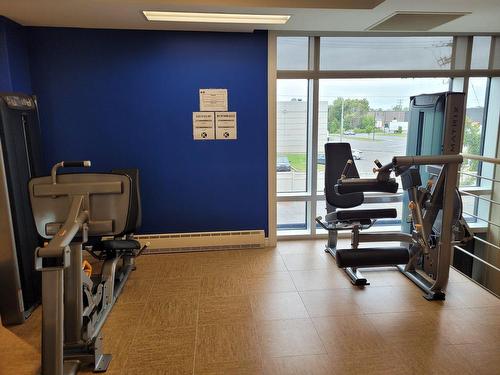 Salle d'exercice - 851-11 Place De La Triade, Pointe-Claire, QC - Indoor Photo Showing Gym Room