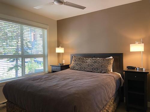 214D - 2049 Summit Drive, Panorama, BC - Indoor Photo Showing Bedroom