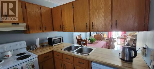 6-8 Atlantic Street, Marystown, NL - Indoor Photo Showing Kitchen With Double Sink