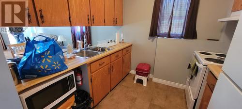 6-8 Atlantic Street, Marystown, NL - Indoor Photo Showing Kitchen With Double Sink