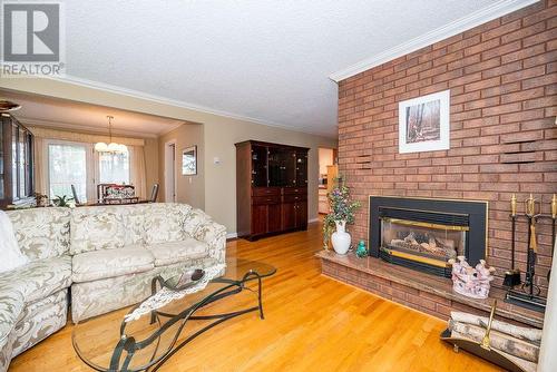 1B Rutherford Avenue, Deep River, ON - Indoor Photo Showing Living Room With Fireplace