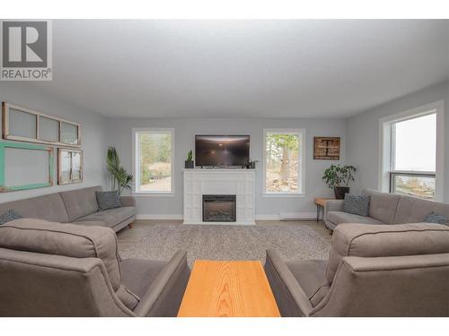 47 Twin Lakes Road, Enderby, BC - Indoor Photo Showing Living Room With Fireplace