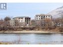 Construction photos as of November 2024. Progress photos may not be indicative of actual unit. Call 250-319-4737 to schedule a site visit. - 215 Royal Avenue Unit# 101, Kamloops, BC  - Outdoor With Body Of Water 