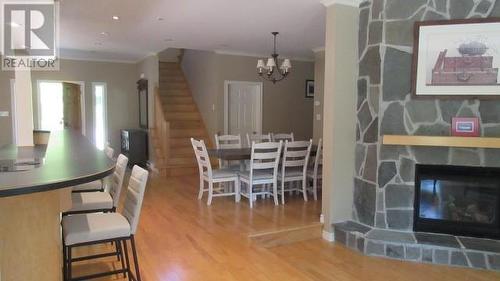 2 Hillside Drive, Humber Valley Resort, NL - Indoor Photo Showing Dining Room With Fireplace