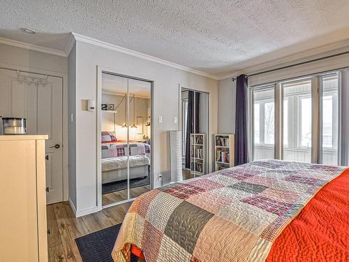 Master bedroom - 211  - 215 Rue Principale E., Sainte-Agathe-Des-Monts, QC - Indoor Photo Showing Bedroom