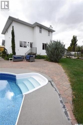 8018 Sherwood Place, Regina, SK - Outdoor With In Ground Pool