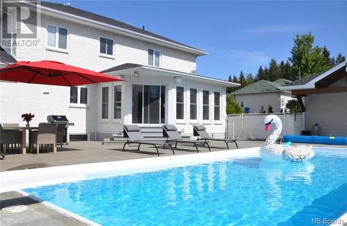 110 Bossé Avenue, Edmundston, NB - Outdoor With In Ground Pool With Deck Patio Veranda