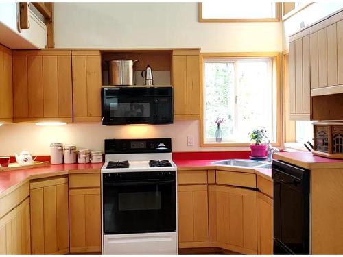 2639 Cherrier Rd, Quadra Island, BC - Indoor Photo Showing Kitchen With Double Sink