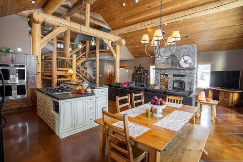 6016 Cunliffe Road, Fernie, BC - Indoor Photo Showing Dining Room With Fireplace