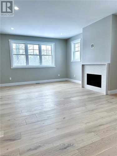 8 Thimbleweed Drive, Bluewater (Bayfield), ON - Indoor Photo Showing Other Room With Fireplace