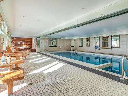 Piscine - L315-2100 Av. Terry-Fox, Laval (Chomedey), QC - Indoor Photo Showing Other Room With In Ground Pool