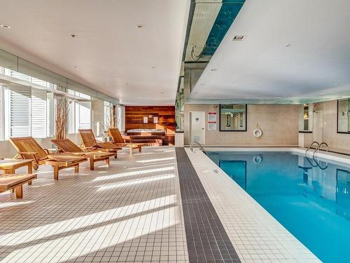 Piscine - L315-2100 Av. Terry-Fox, Laval (Chomedey), QC - Indoor Photo Showing Other Room With In Ground Pool