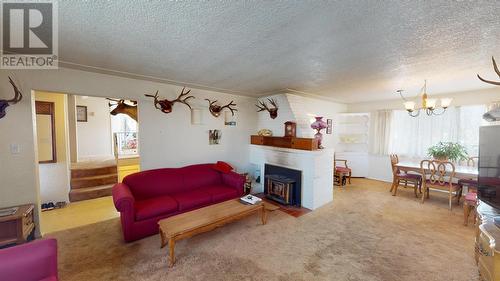 910 Graham Avenue, Quesnel, BC - Indoor Photo Showing Living Room With Fireplace