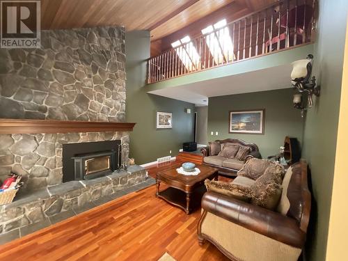 12 Collier Place, Tumbler Ridge, BC - Indoor Photo Showing Living Room With Fireplace