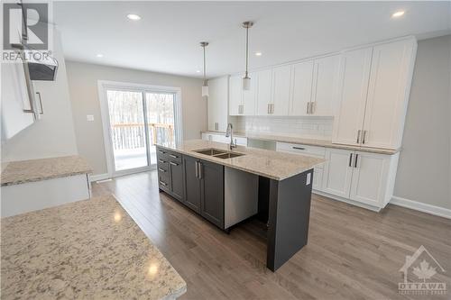 4642 Cornett Lane, St Andrews West, ON - Indoor Photo Showing Kitchen With Double Sink