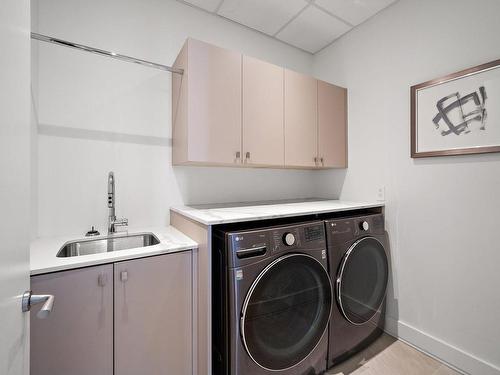 Salle de lavage - 503-1300 Rue Les Érables, Laval (Laval-Sur-Le-Lac), QC - Indoor Photo Showing Laundry Room