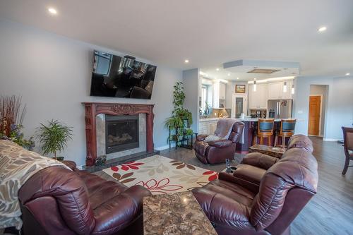 2977 Upper Levels Road, Castlegar, BC - Indoor Photo Showing Living Room With Fireplace